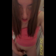 Emi squeezes into a tight plane bathroom in a pink top, pushes hard lumps out of her ass onto the toilet lid, takes a mirror selfie, and shows off the pile. Vertical format video. Over 9 minutes.